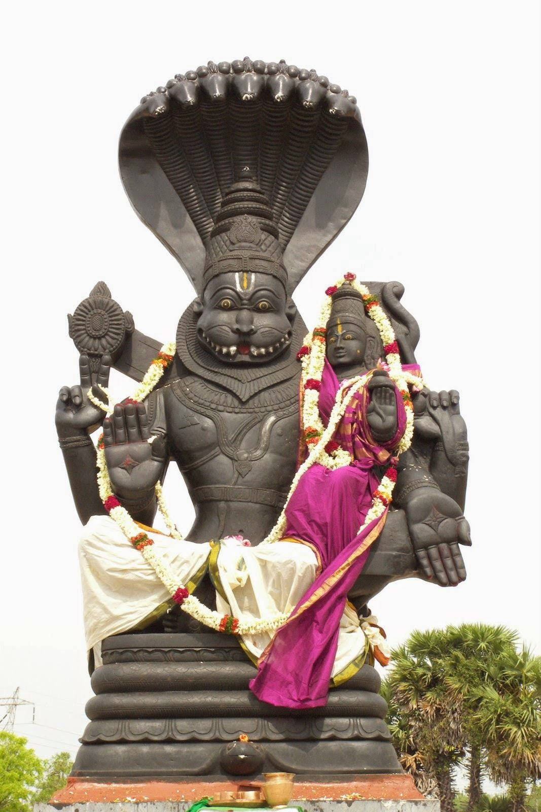 Majestic Lakshmi Narasimha Statue Background