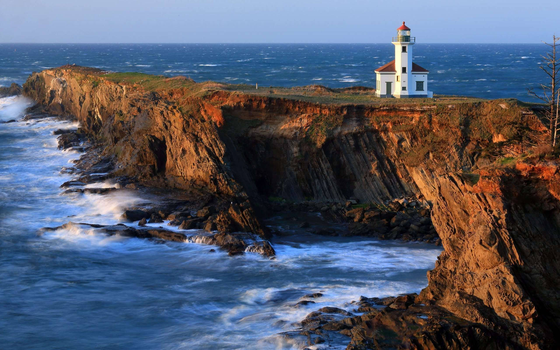 Majestic Lighthouse At Dusk Background