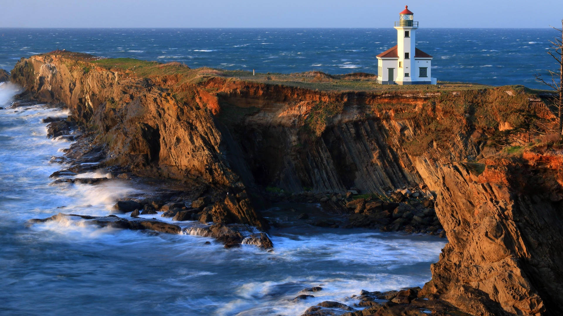 Majestic Lighthouse Standing Tall At Cape Arago, Oregon