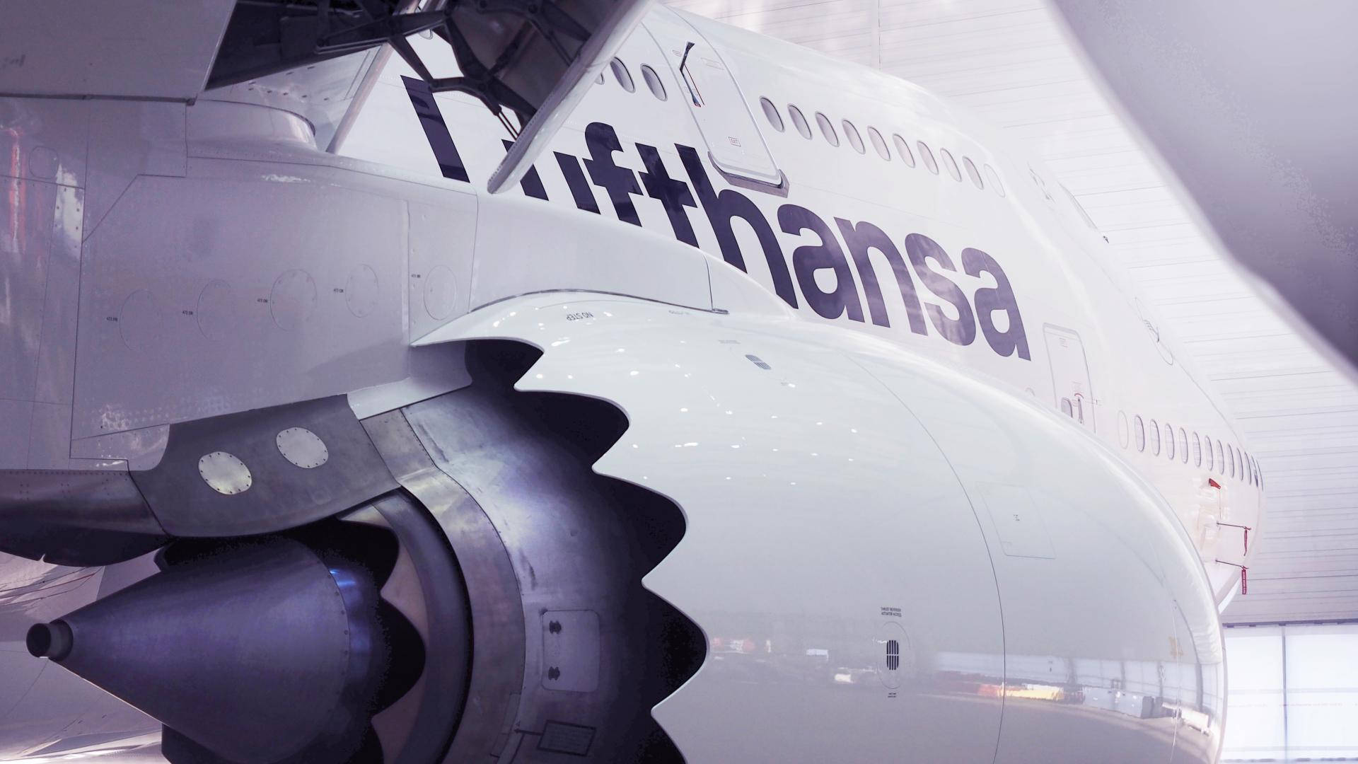 Majestic Lufthansa Airbus In Full Flight Background