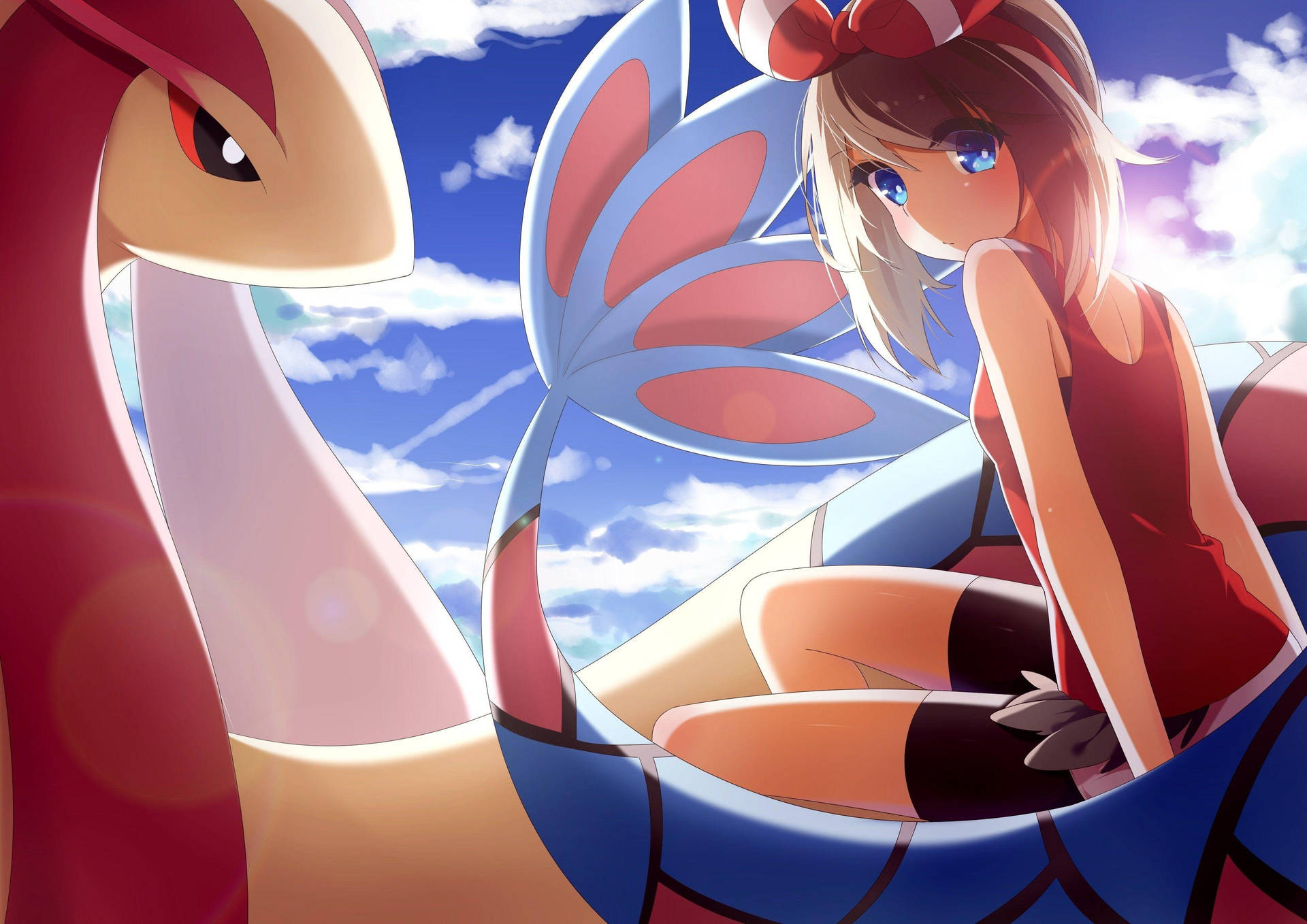 Majestic Milotic Embracing The Cloudy Sky Background
