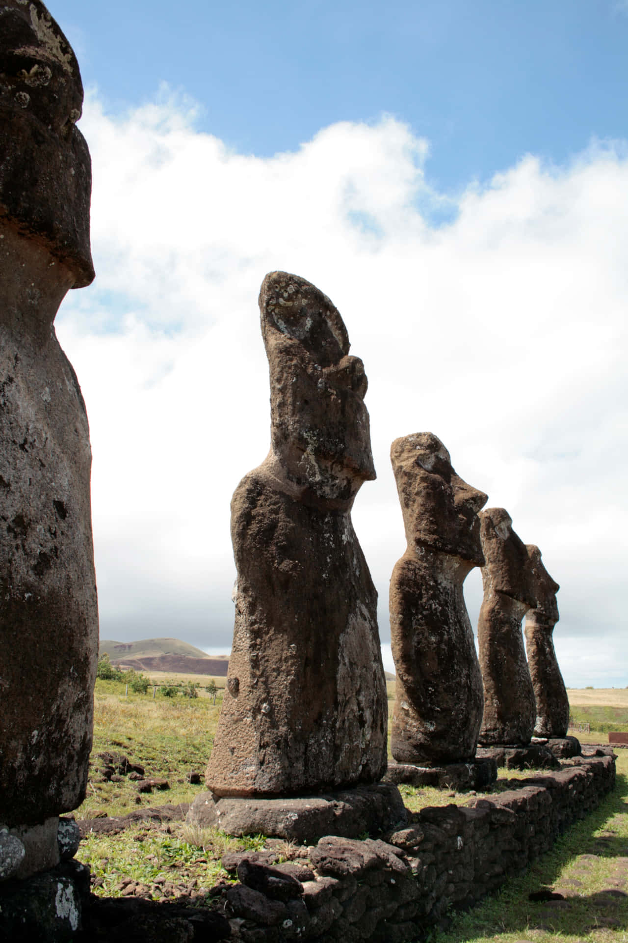 Majestic Moai Statues Under The Clear Sky Background