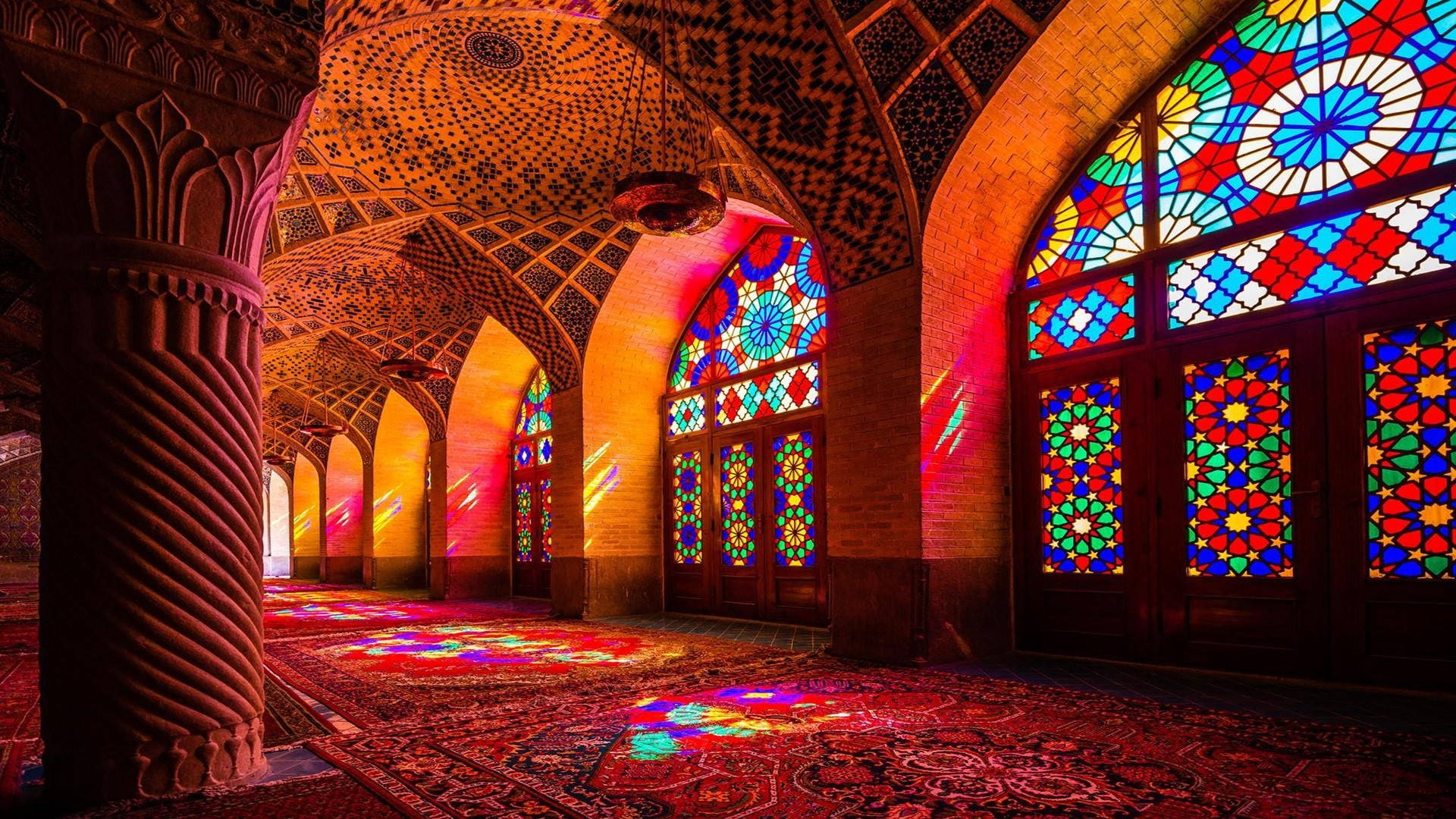 Majestic Mosque Illuminated By Stained Glass Background