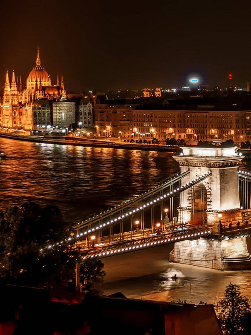 Majestic Night View Of Budapest City Background