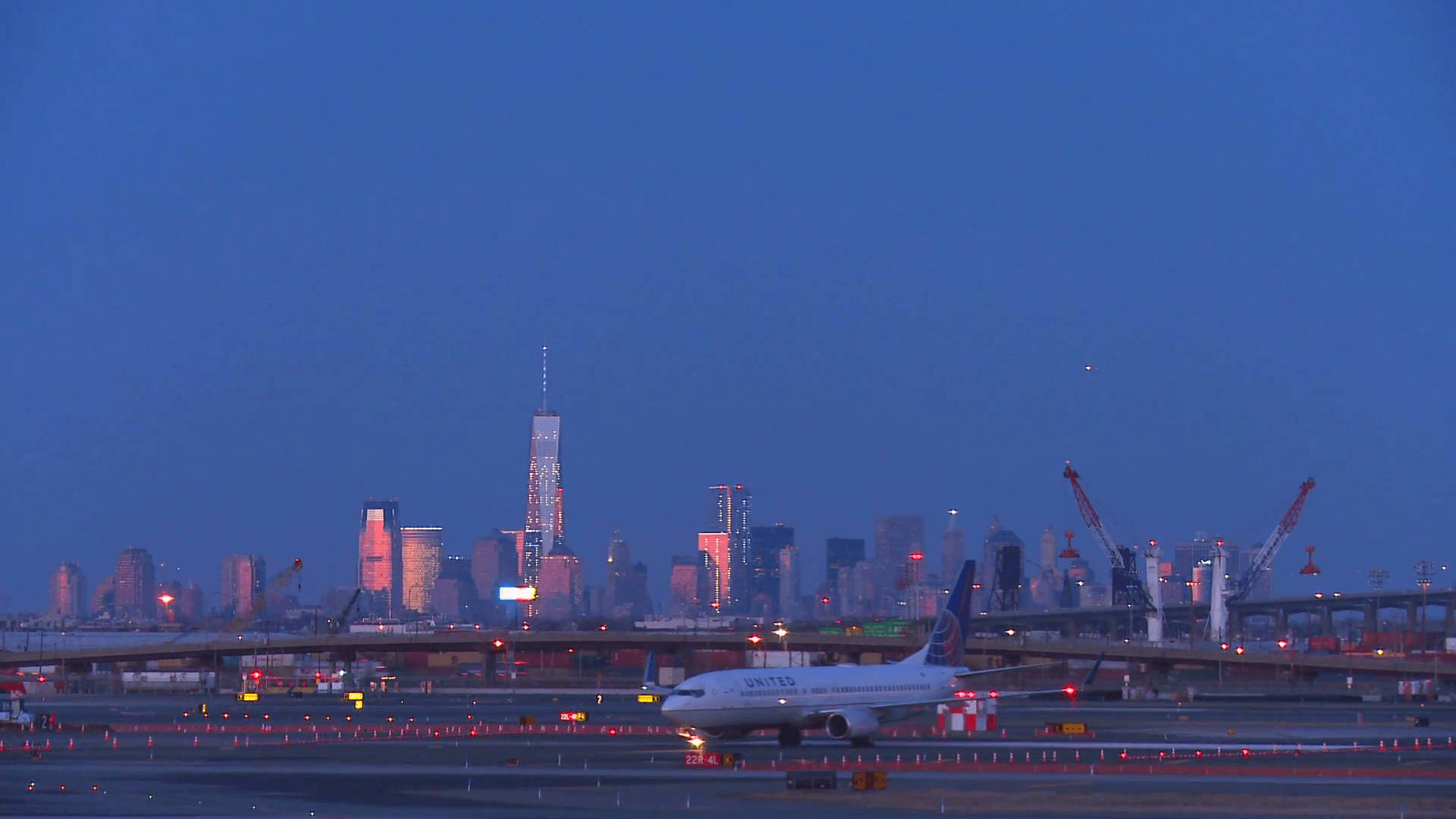 Majestic Night View Of Newark Liberty International Airport Background