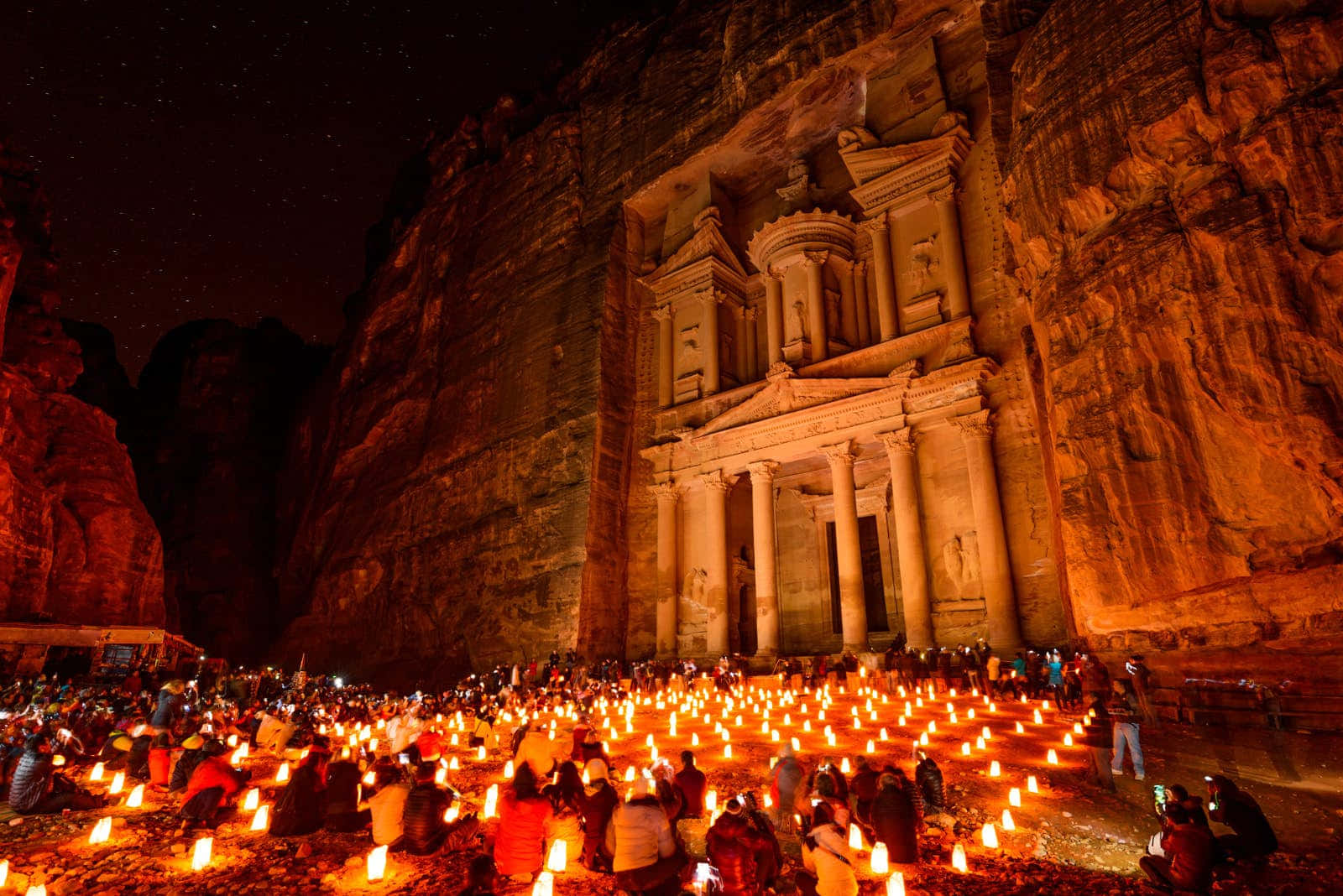Majestic Night View Of The Treasury In Petra Background
