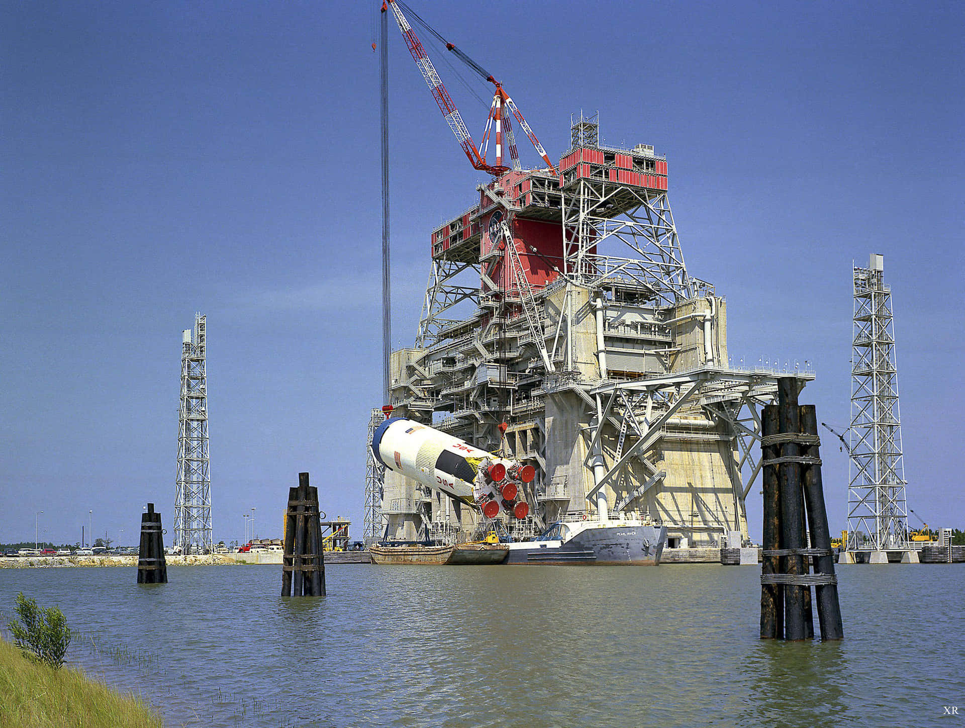 Majestic Oil Rig Amidst A Fiery Ignition Background