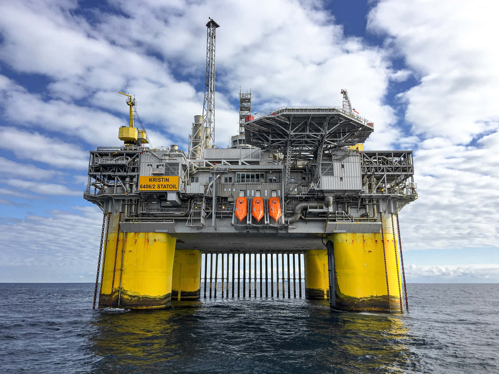 Majestic Oil Rig Operations At Dusk