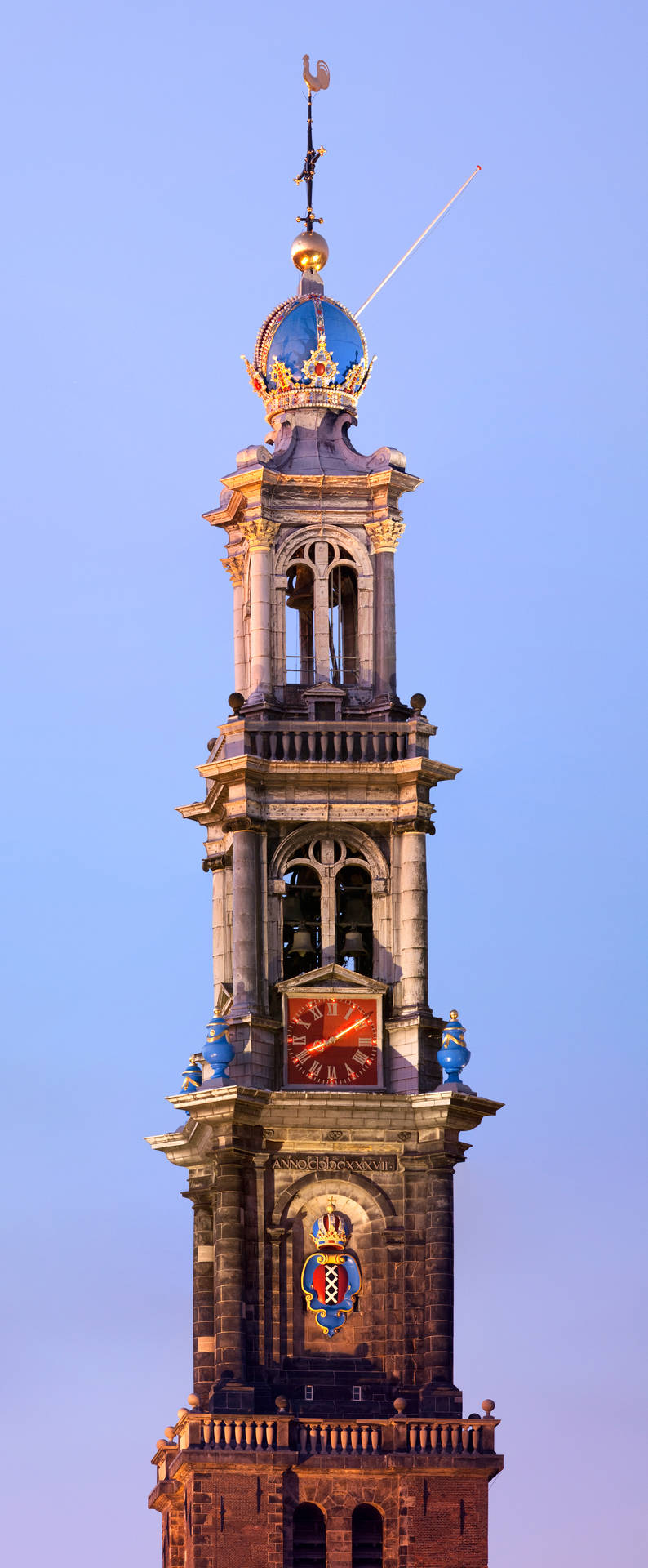 Majestic Peak Of Westerkerk Tower In Amsterdam Background