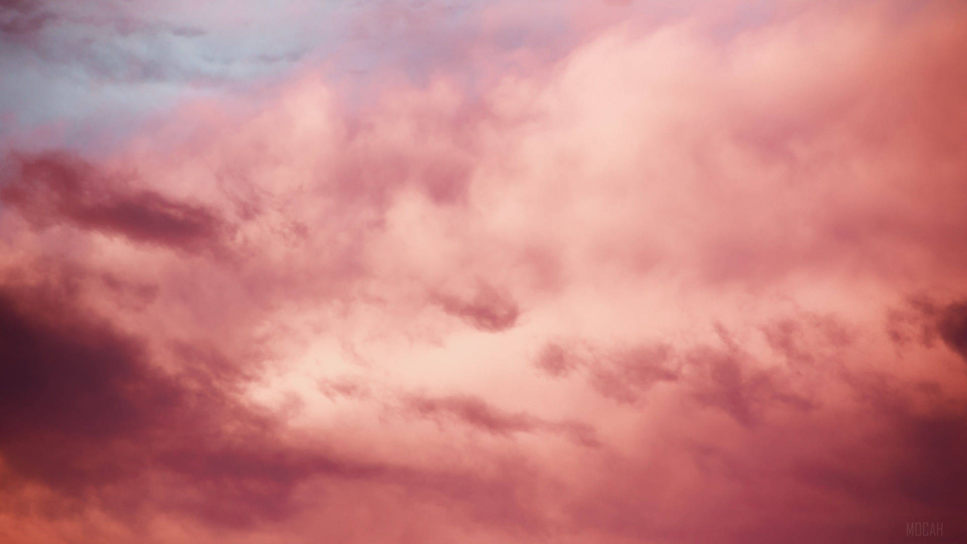 Majestic Pink Cloud Illuminating The Sky Background