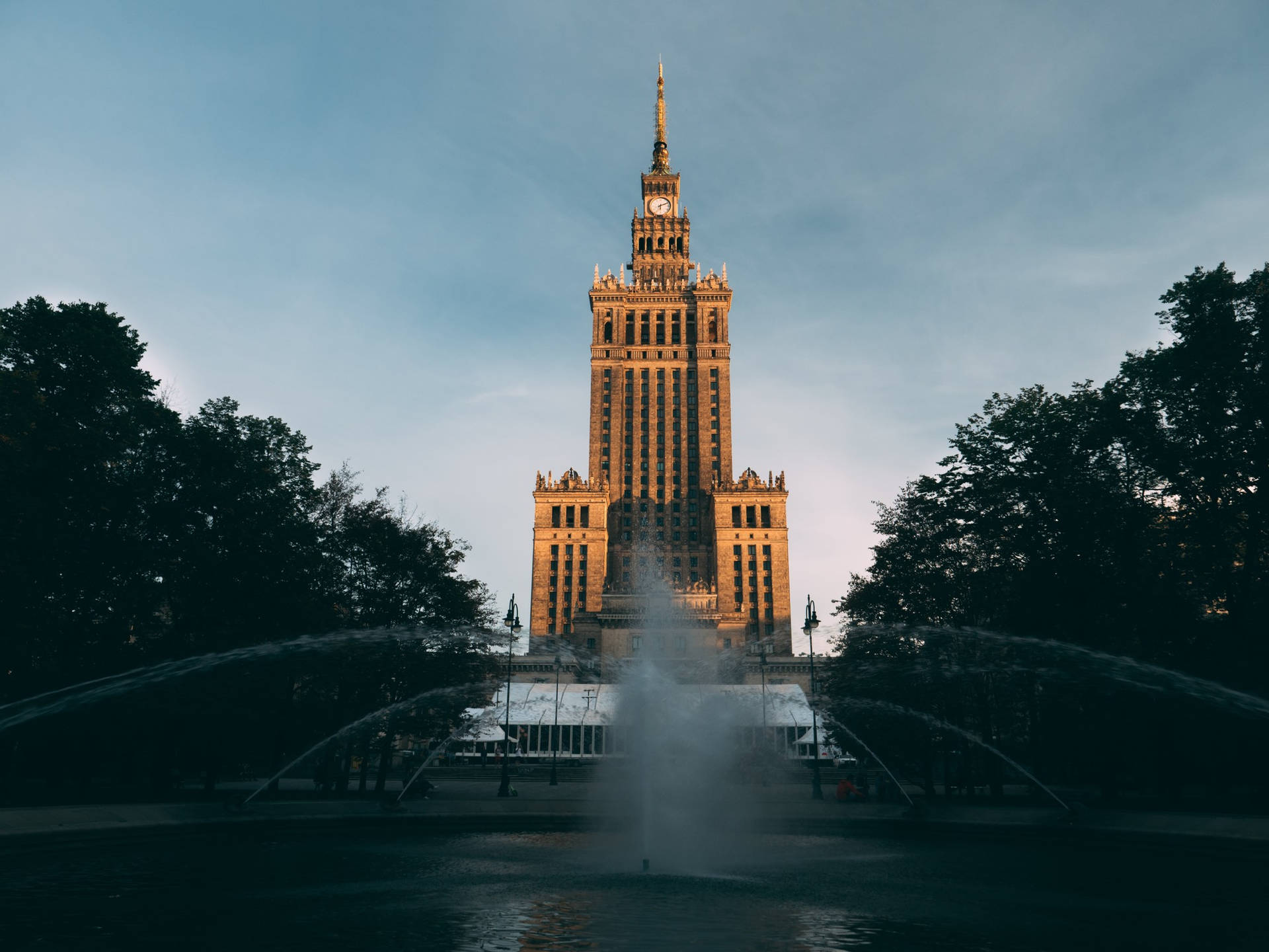 Majestic Poland's Palace Of Culture Against Blue Sky