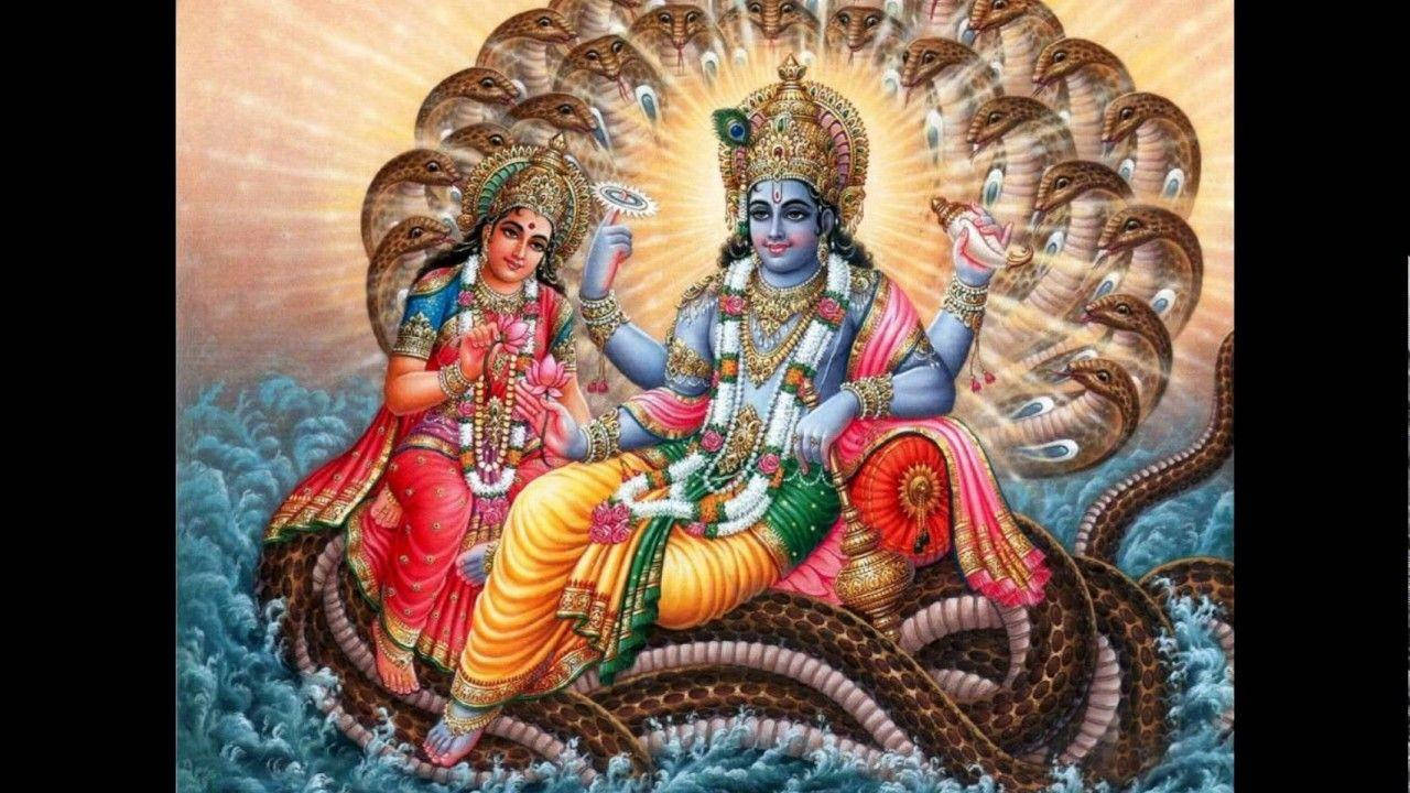 Majestic Portrayal Of Lord Vishnu With Goddess Lakshmi Background