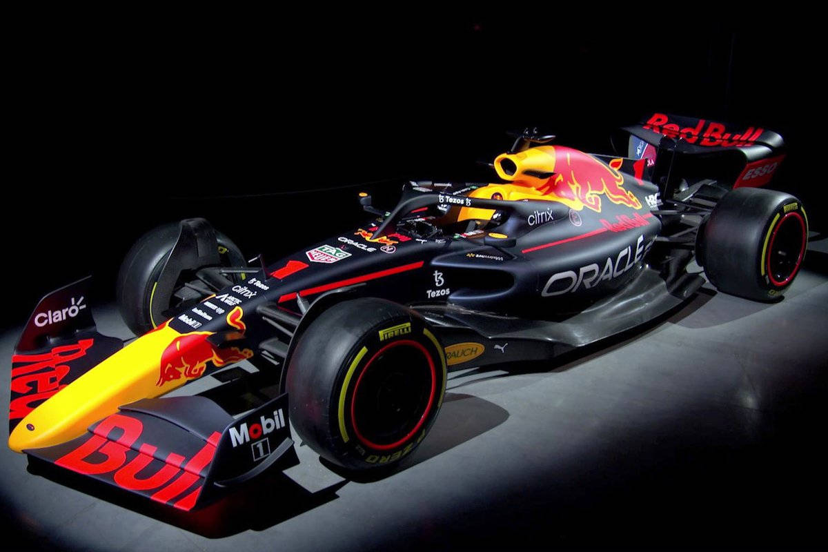 Majestic Red Bull Racing Car In A Mysterious Dark Room