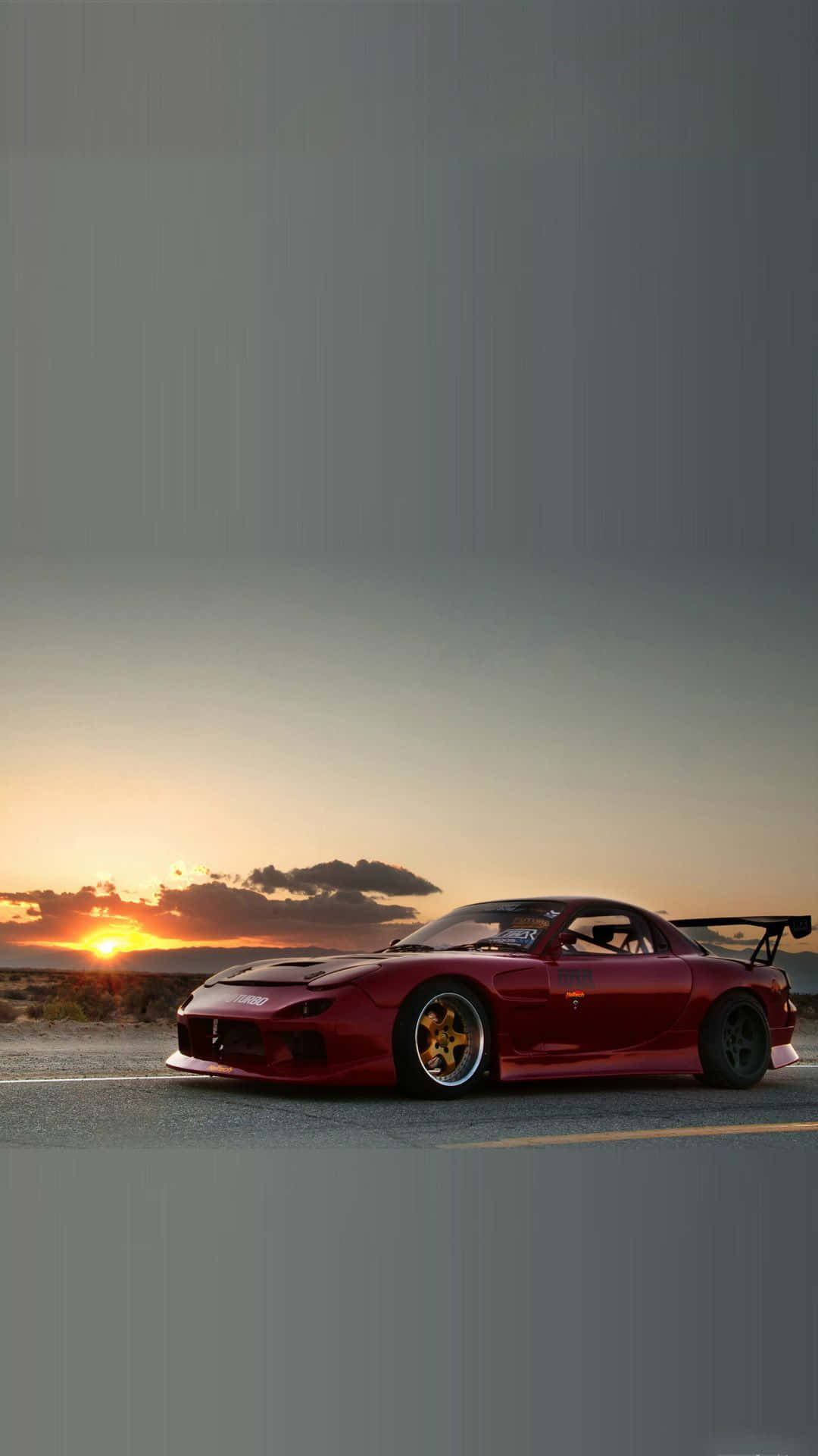 Majestic Red Mazda Rx 7 At Sunset Background