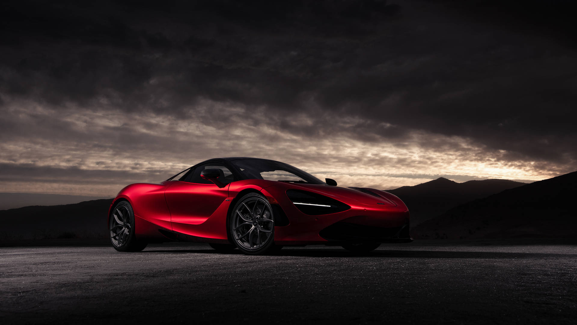 Majestic Red Mclaren 720s Glowing In The Night Background