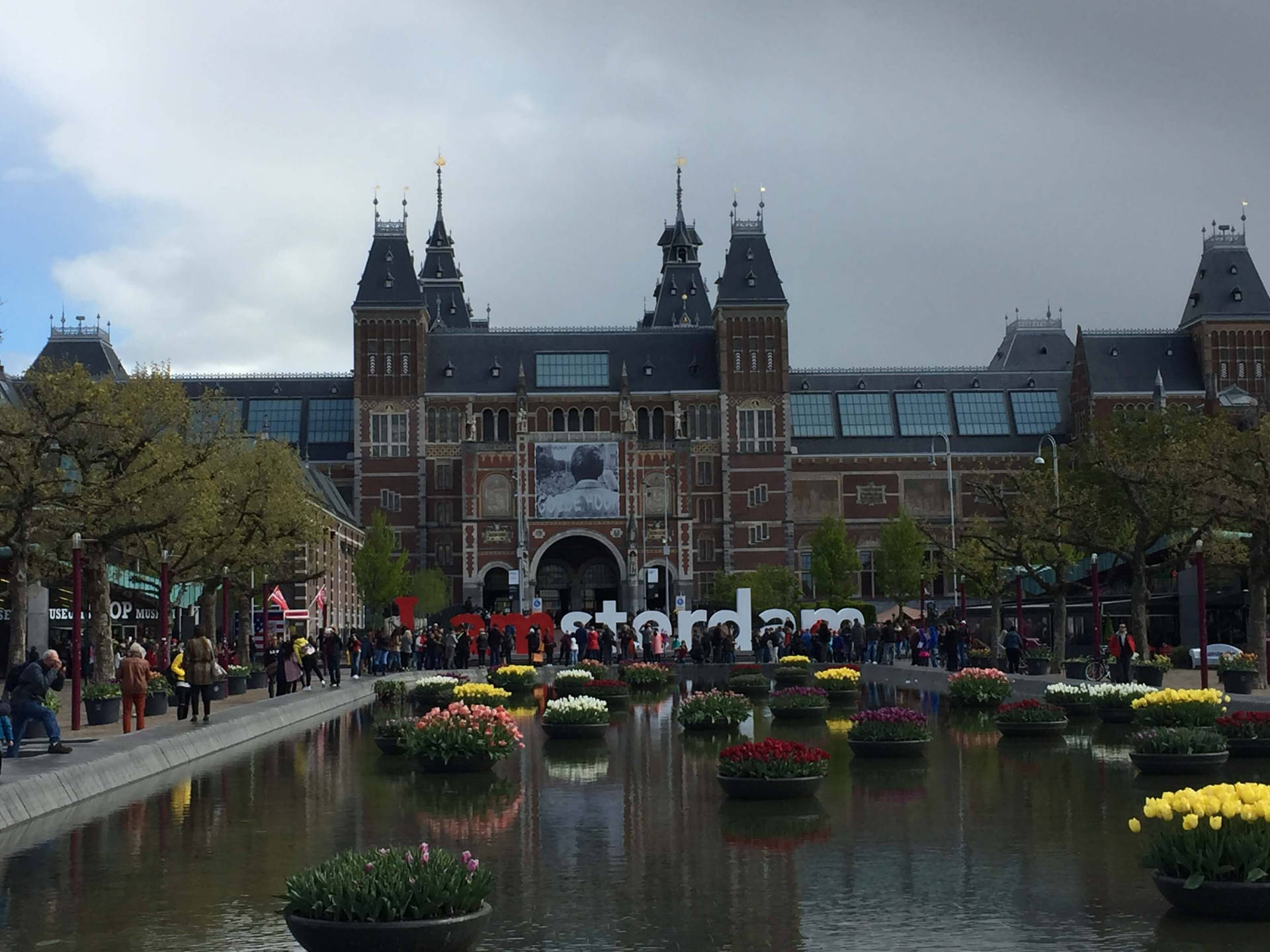 Majestic Rijksmuseum On A Cloudy Day Background