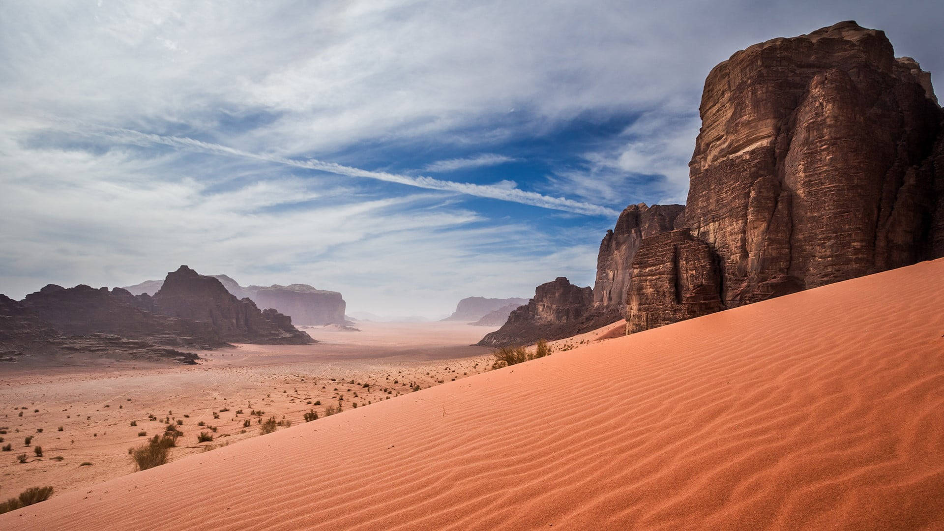 Majestic Sand Dunes In Jordan Background