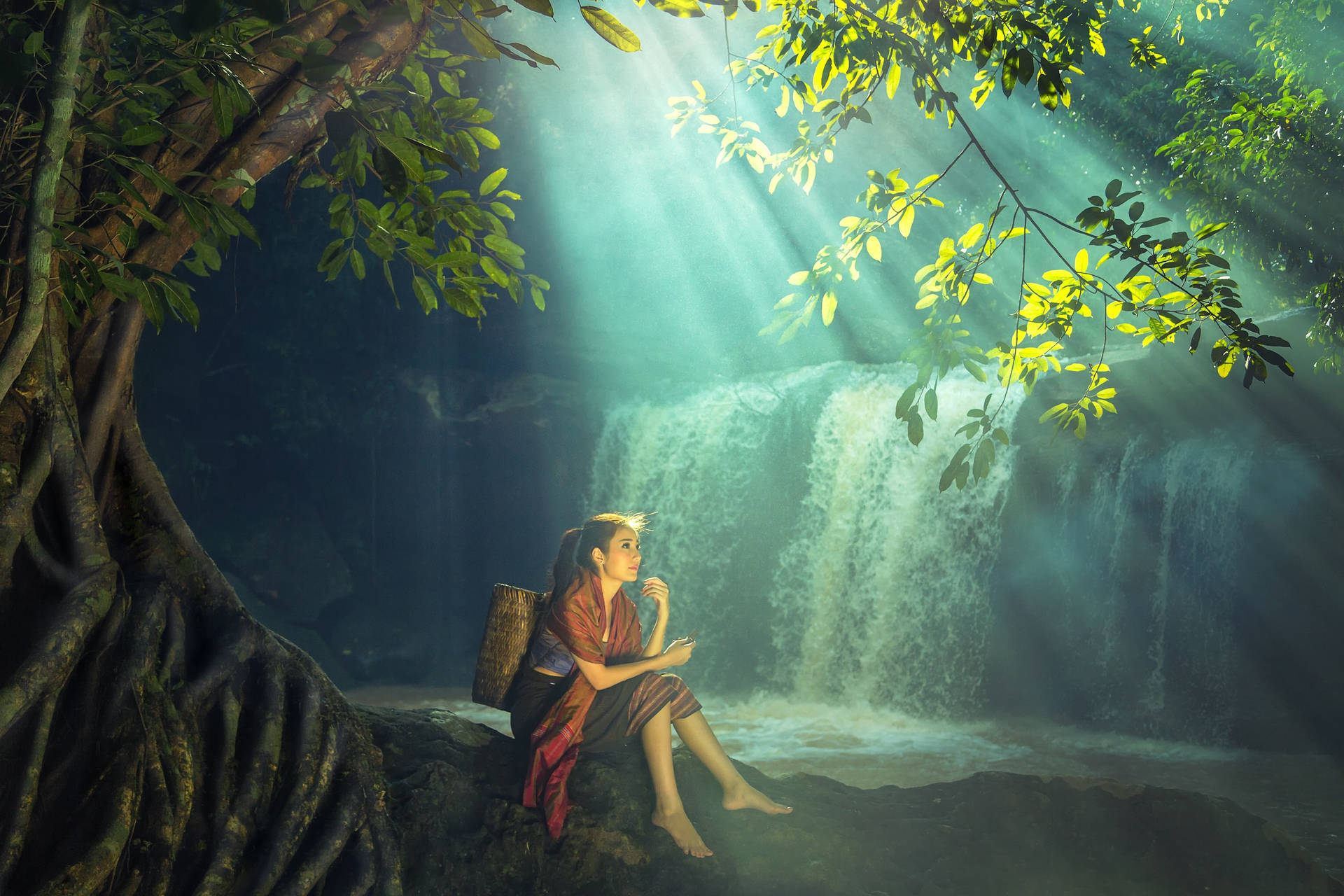 Majestic Serenity: Woman At A Beautiful Waterfall