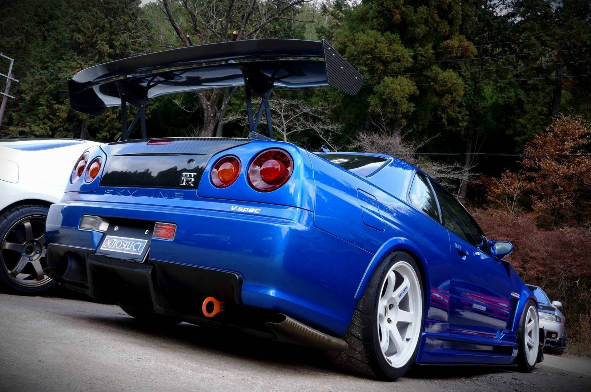 Majestic Shot Of A Nissan Skyline Gtr R34 In High-definition. Background