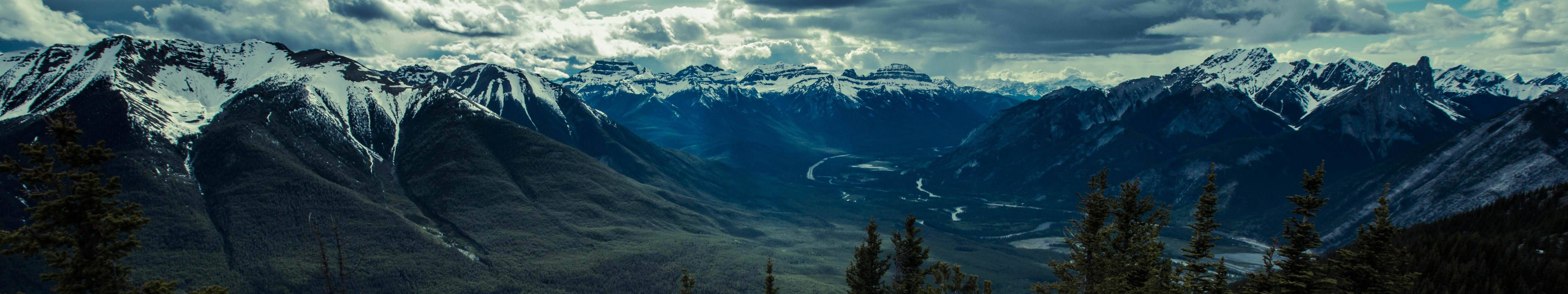 Majestic Snow-capped Mountains Triple Screen Display Background