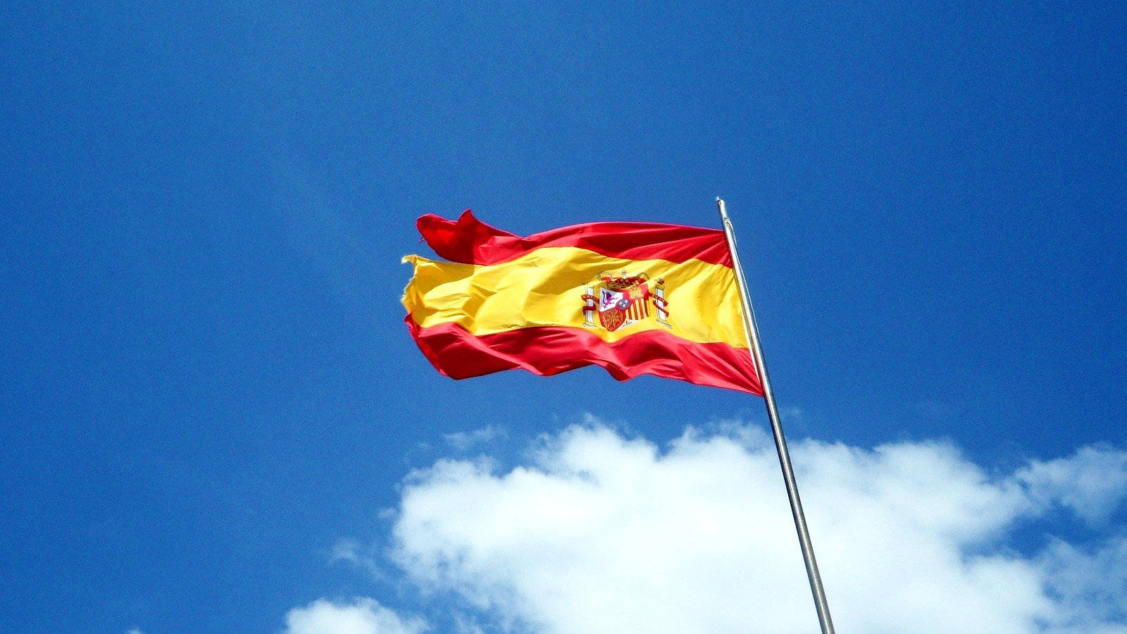 Majestic Spanish Flag In Mid-air