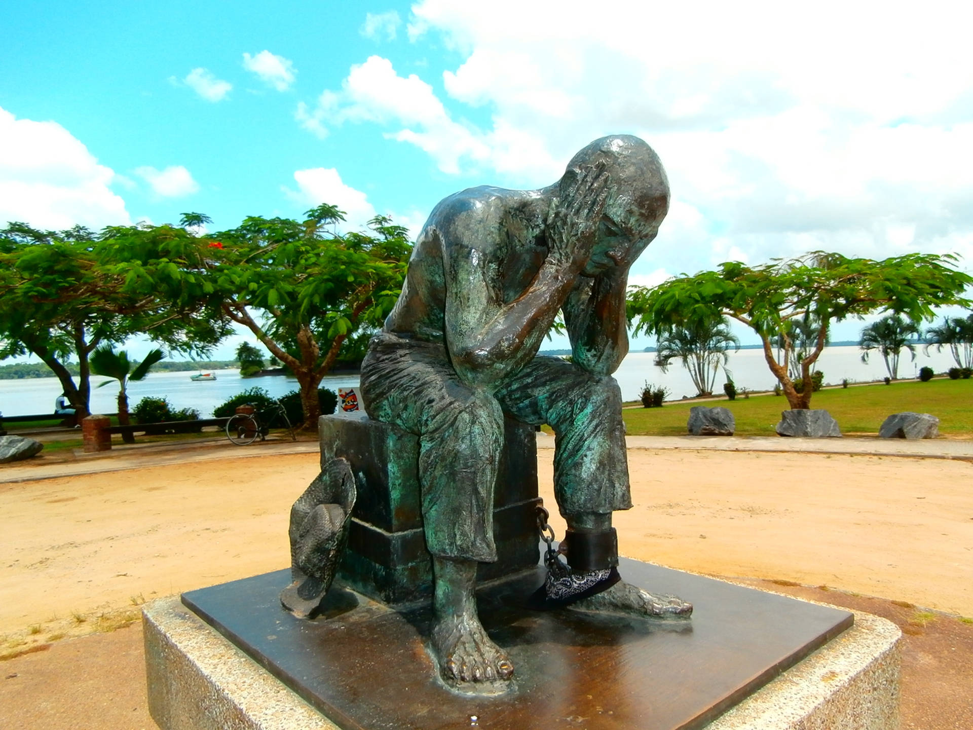 Majestic Statue In French Guiana Background