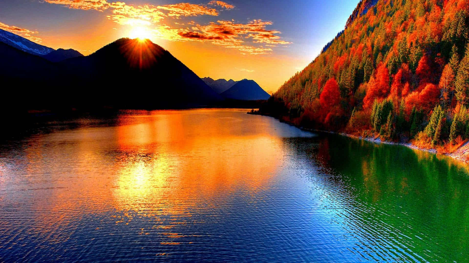 Majestic Sunset On Lake And Mountain Background