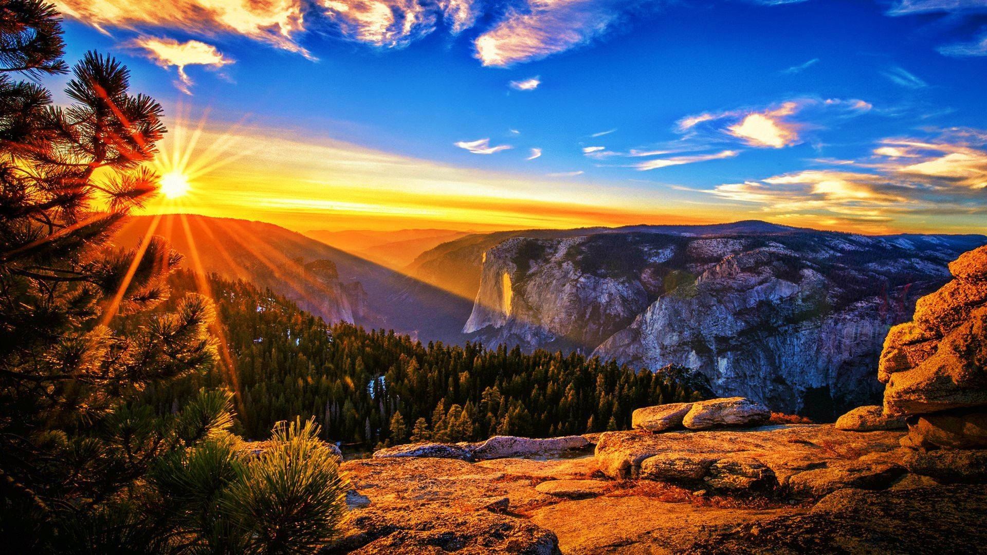 Majestic Sunset Over Rocky Mountain National Park Background