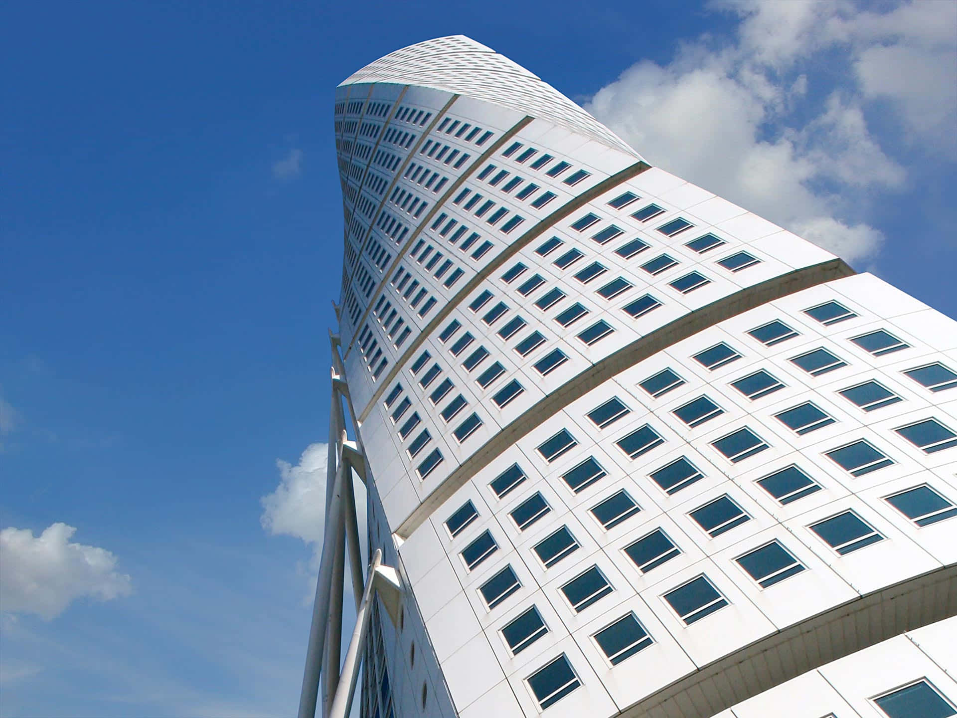 Majestic Turning Torso Skyscraper Reaching Into The Blue Sky