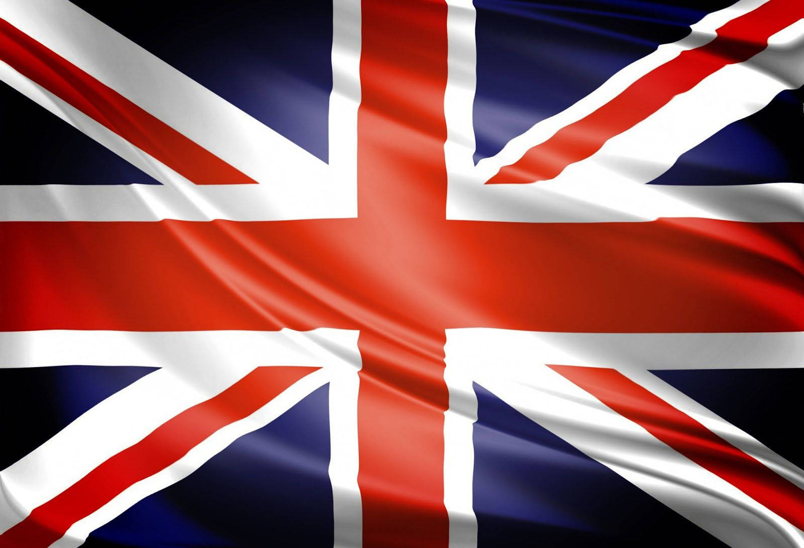 Majestic United Kingdom Flag In A Dark Setting Background