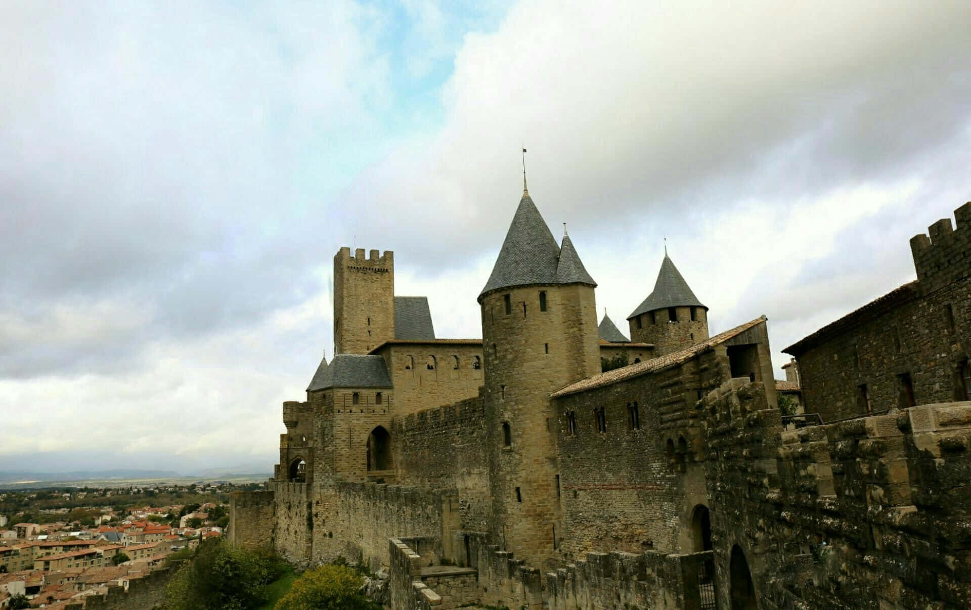 Majestic View Of Carcassonne Castle And Ramparts Background