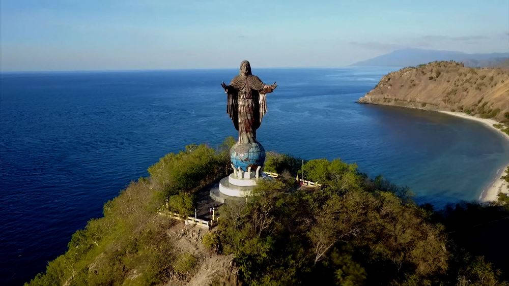 Majestic View Of Cristo Rei Statue In Timor Leste Background