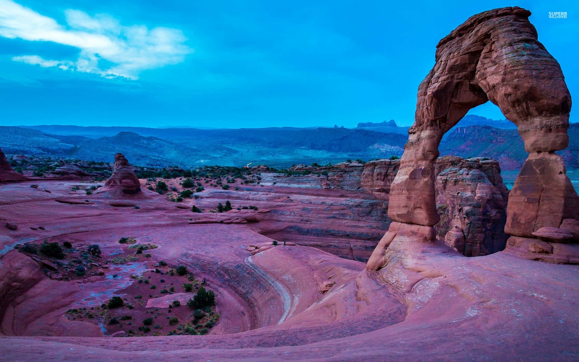 Majestic View Of Delicate Arch At Sunset Background