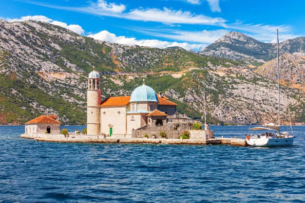 Majestic View Of Our Lady Of The Rocks Church In Montenegro