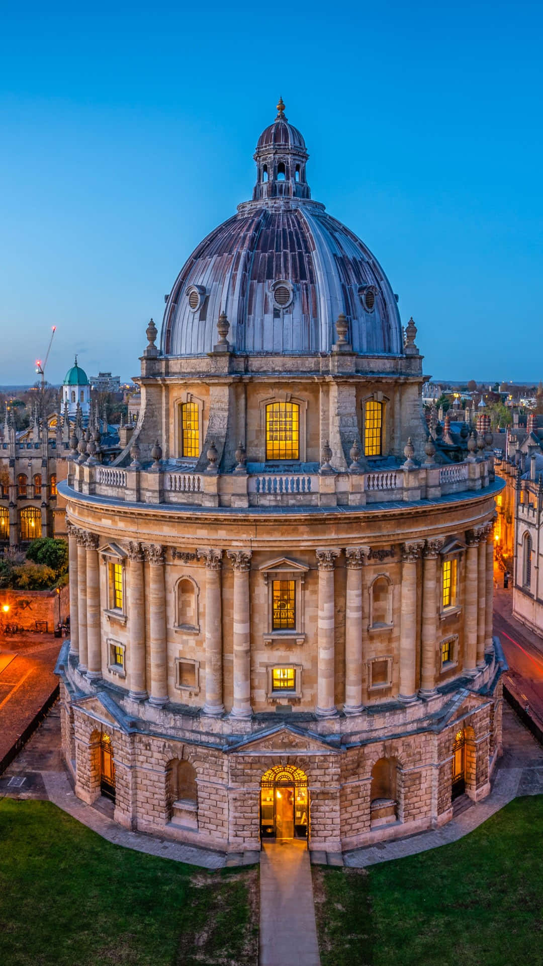 Majestic View Of Radcliffe Camera In Oxford University At Nighttime Background