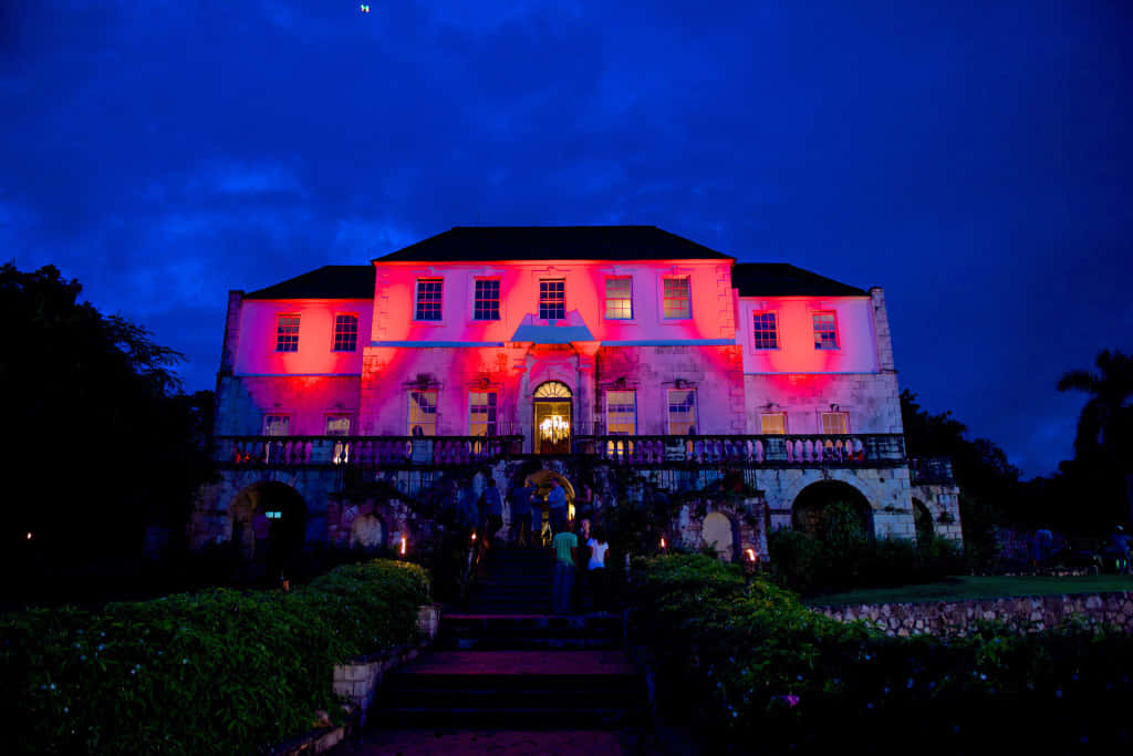Majestic View Of Rose Hall Great House Under The Blue Evening Sky Background