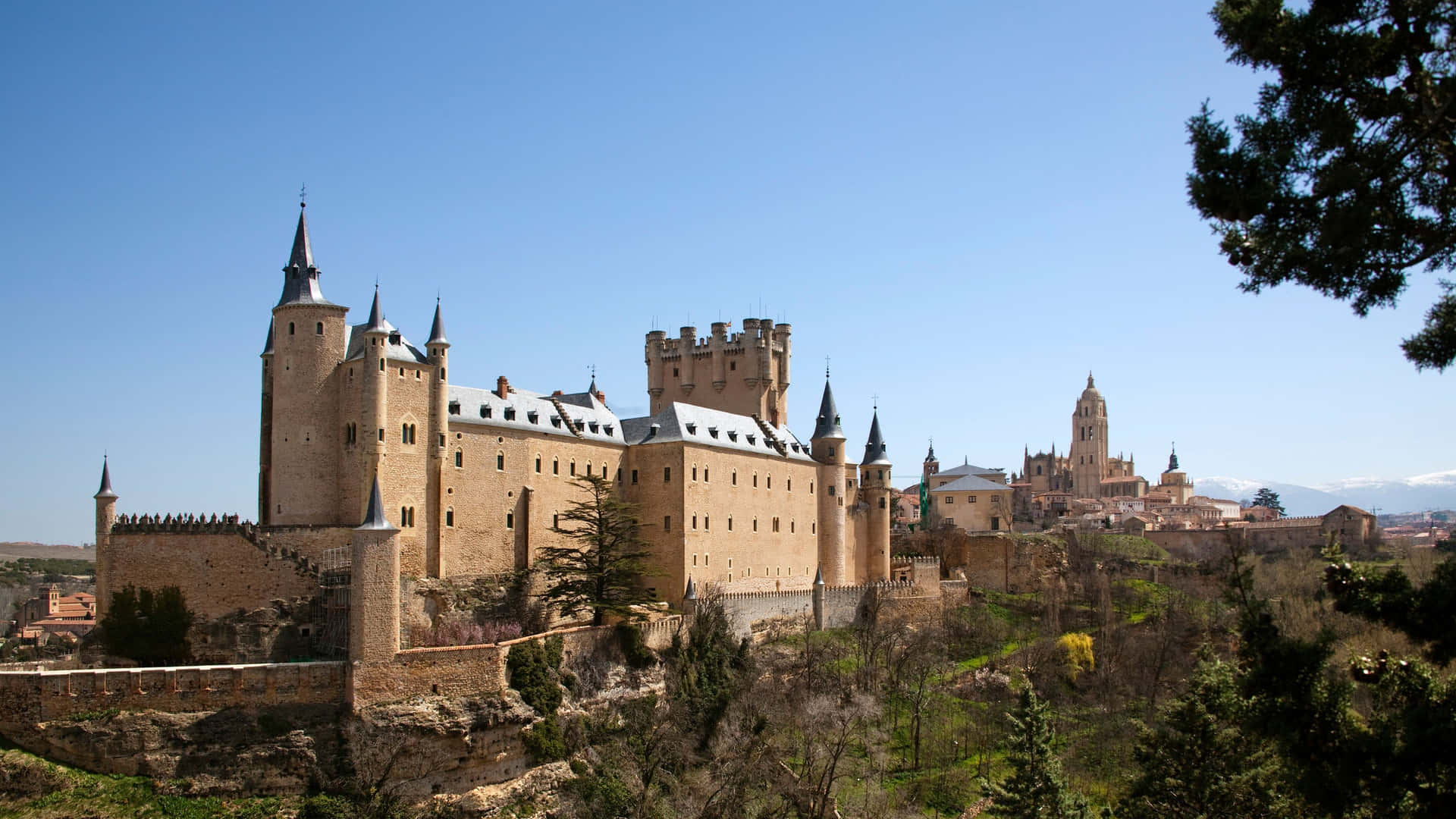 Majestic View Of Segovia Castle At Sunset Background