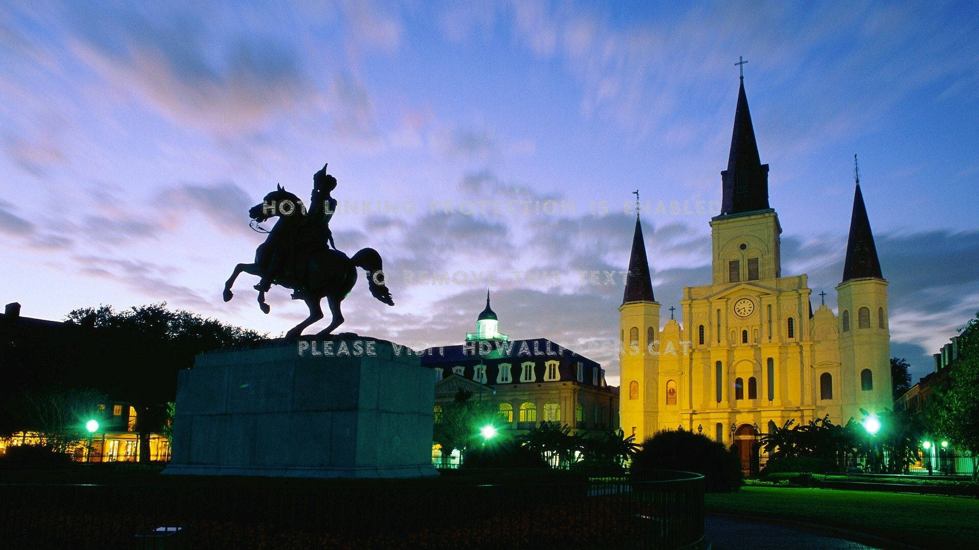 Majestic View Of St. Louis Cathedral With A Statue In The French Quarter