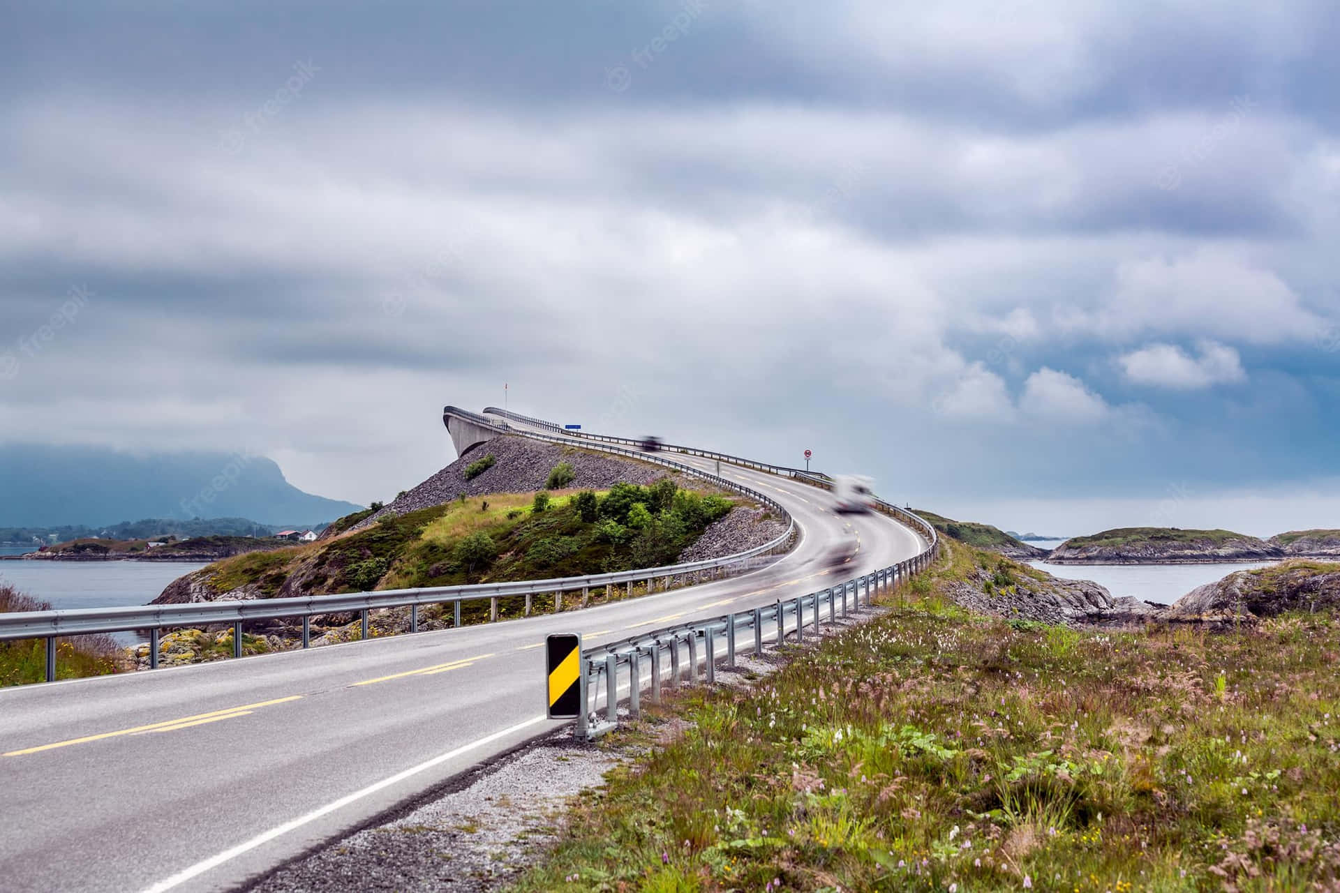 Majestic View Of Storseisundet Bridge On A Cloudy Day Background