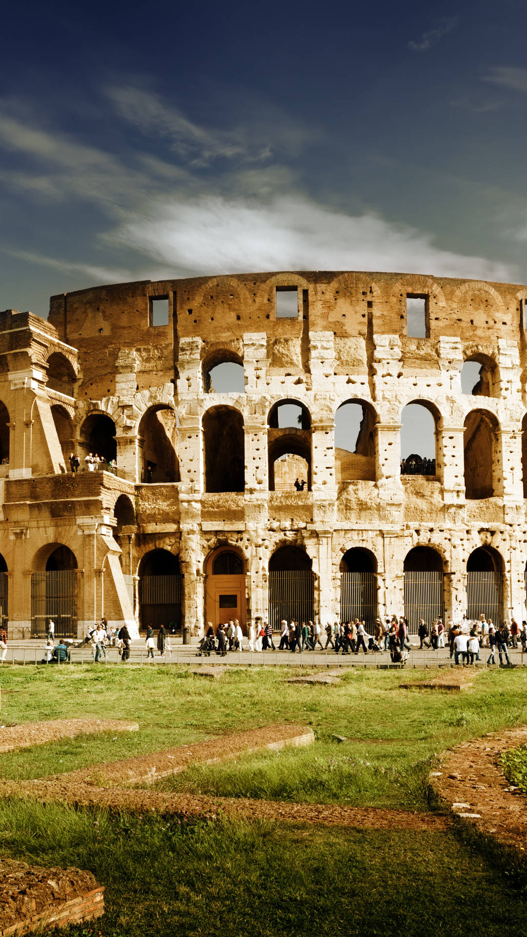 Majestic View Of The Ancient Colosseum In Rome, Italy Background