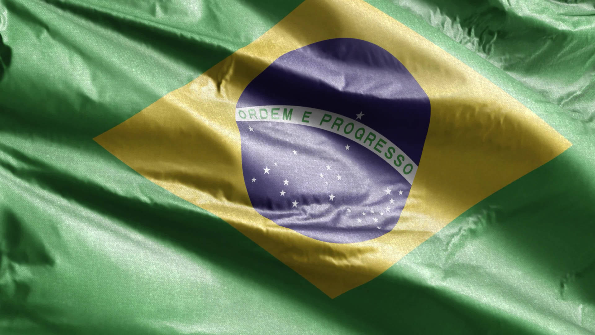 Majestic View Of The Brazil Flag Flying High Background