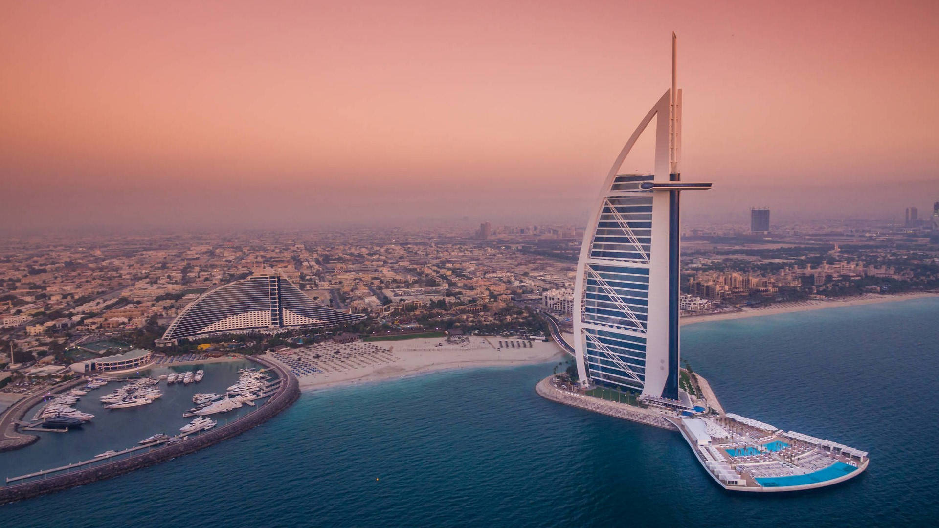 Majestic View Of The Burj Al Arab In All Its Glory Background