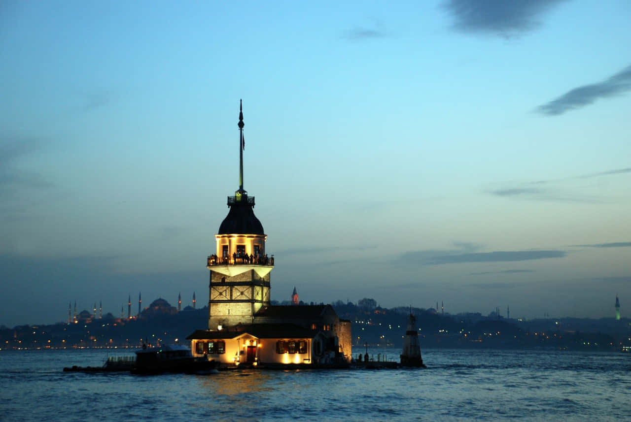 Majestic View Of The Historical Maiden Tower At Sunset Background