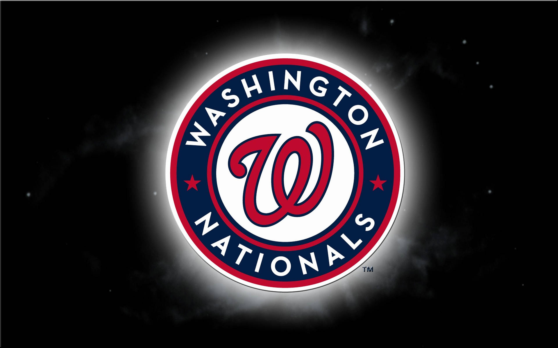 Majestic View Of The Iconic Washington Nationals Logo Shining In The Dark. Background