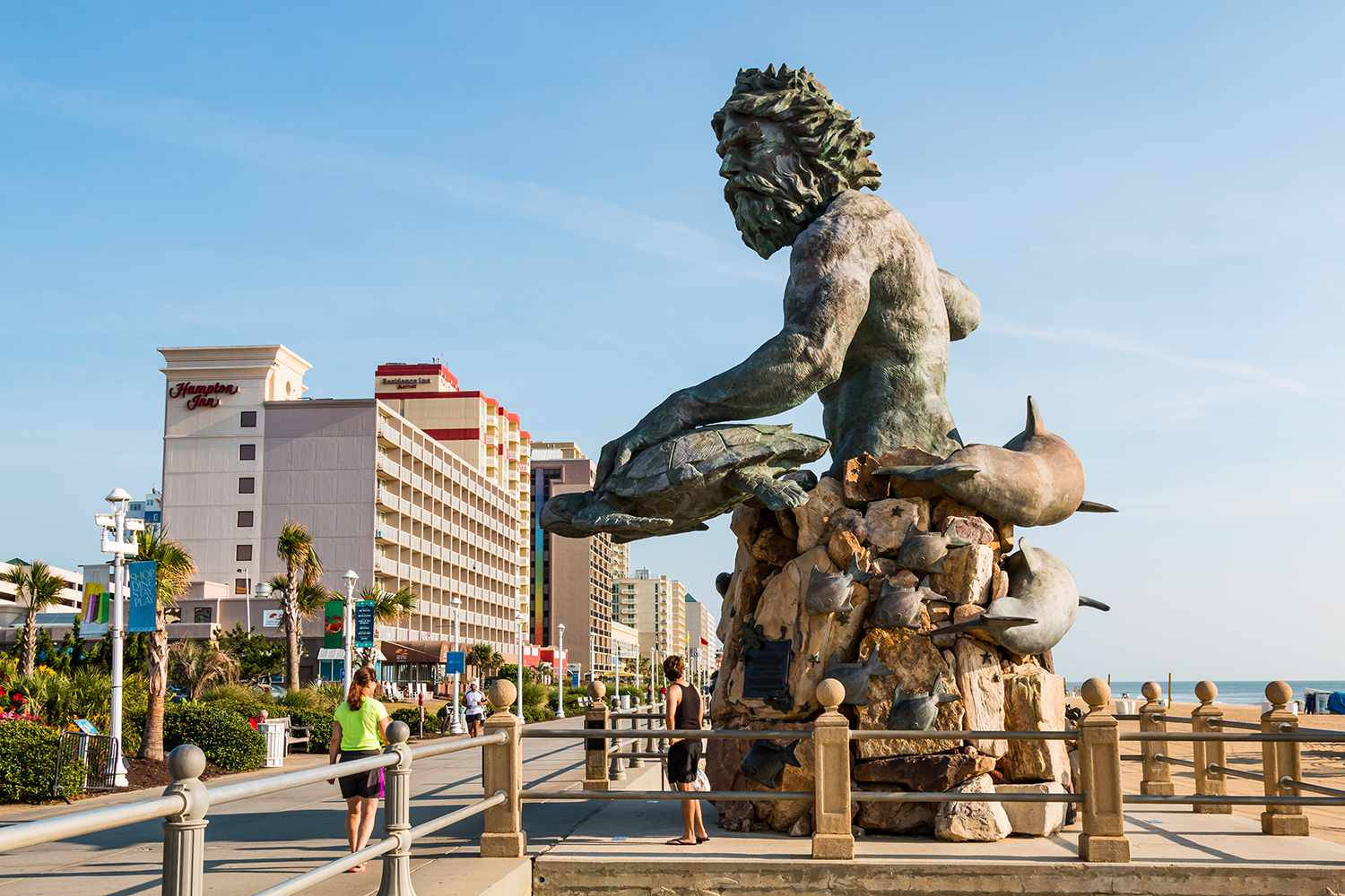 Majestic View Of The King Neptune Statue At Virginia Beach Background