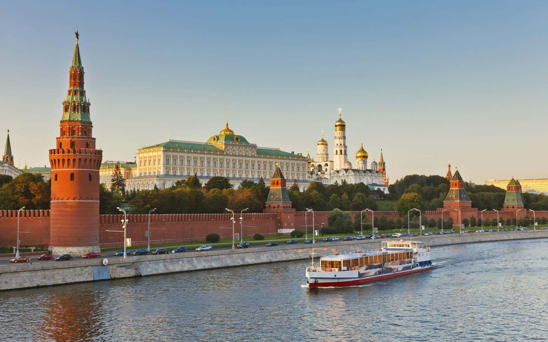 Majestic View Of The Kremlin Palace Amidst A Serene Landscape Background