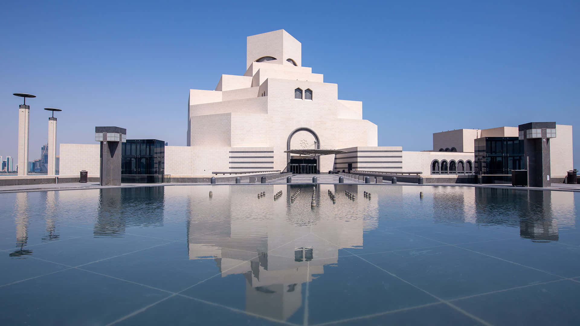Majestic View Of The Museum Of Islamic Art In Dusky Blue Hues Background