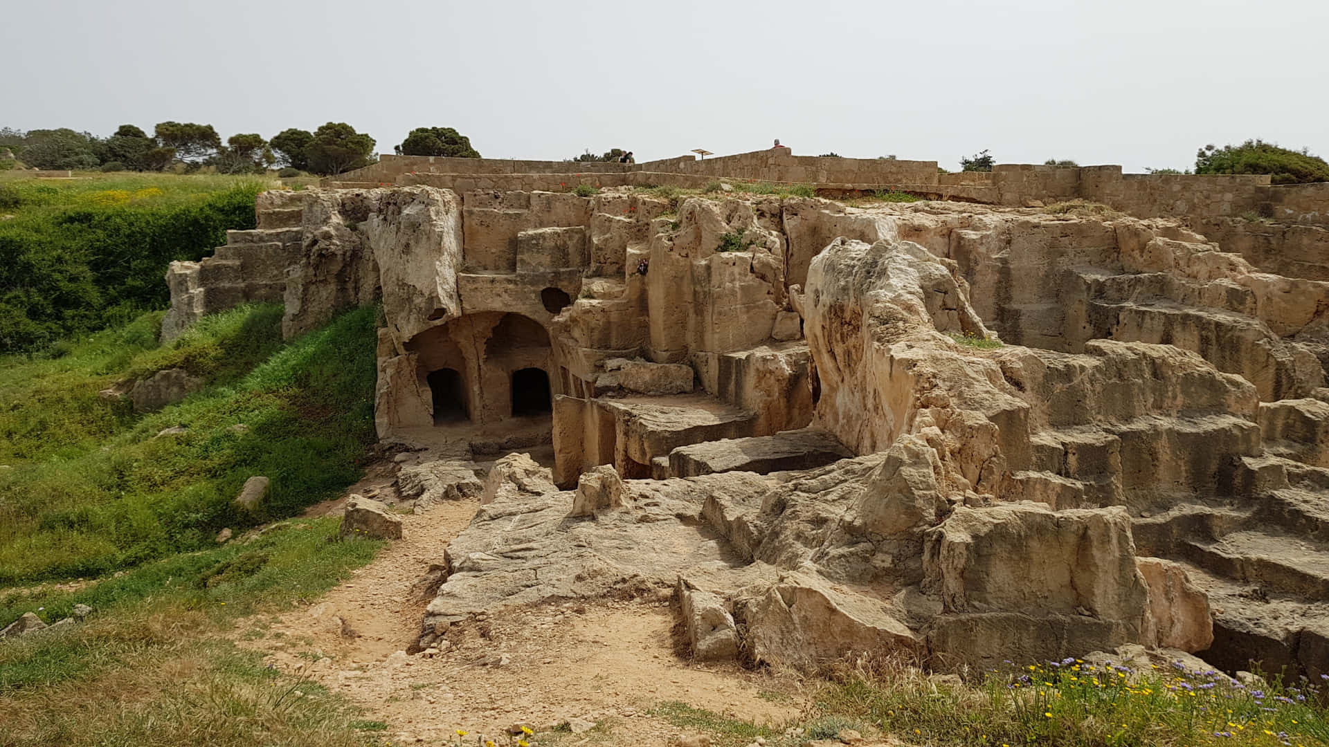 Majestic View Of The Tombs Of The Kings At Sunset Background