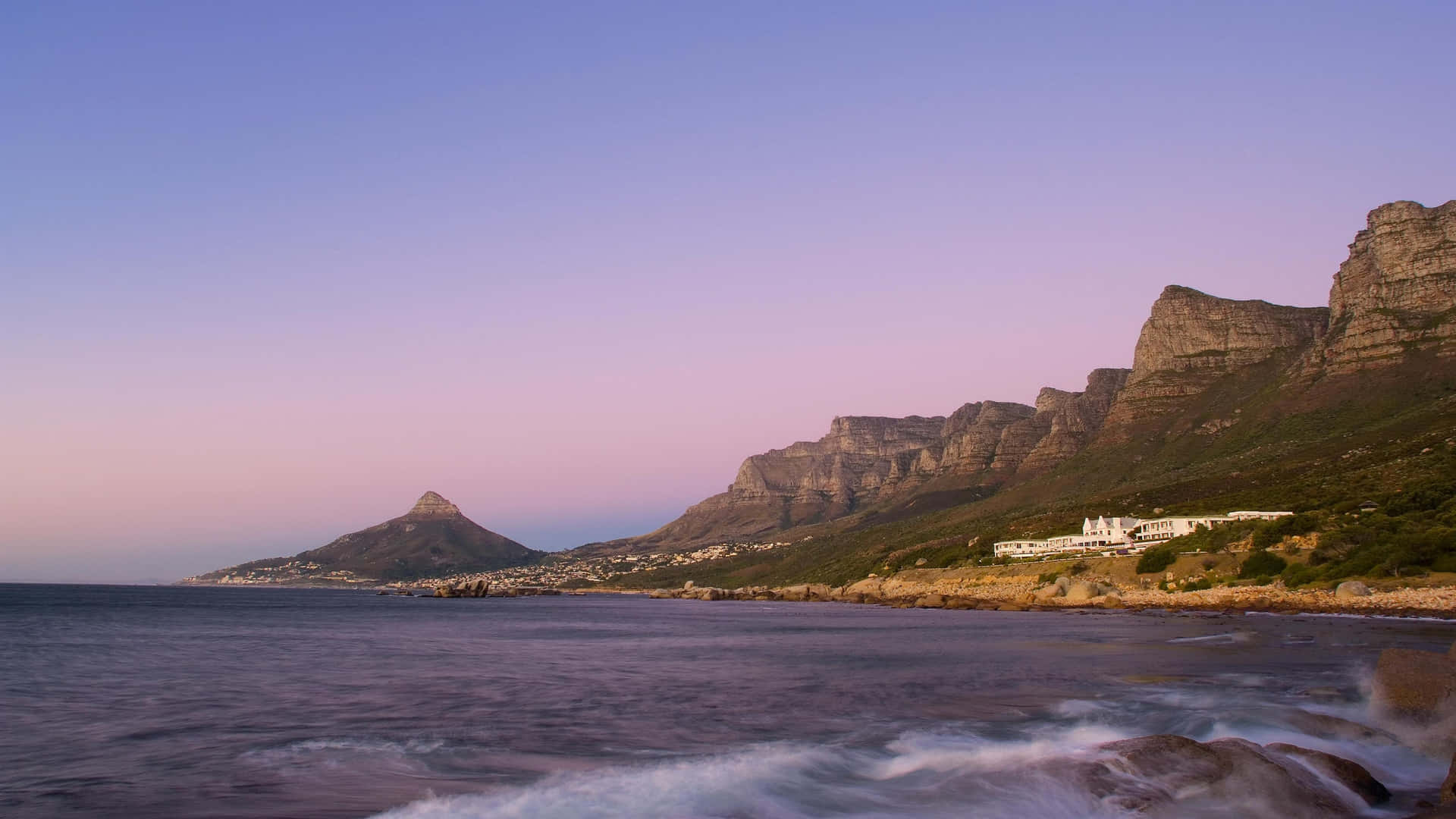 Majestic View Of The Twelve Apostles Hotel And Spa Background