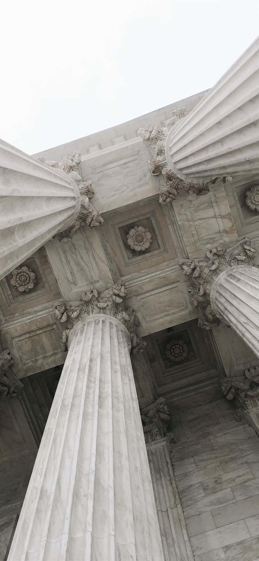 Majestic View Of The U.s Supreme Court Pillars Background